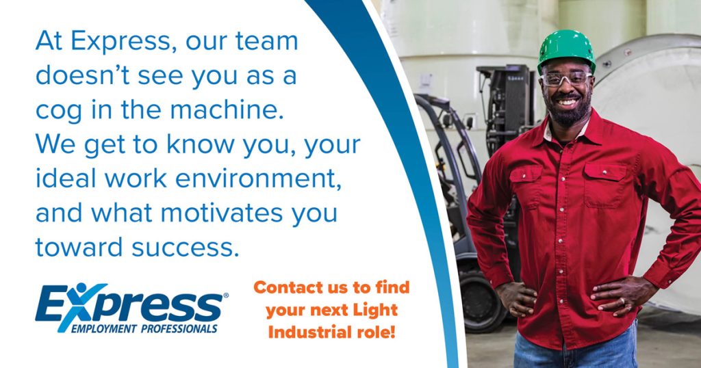 A promotional image for Express Employment Professionals showing a man in a red shirt and green helmet, standing in an industrial setting next to text about employment services. Transcribed Text: At Express, our team doesn’t see you as a cog in the machine. We get to know you, your ideal work environment, and what motivates you toward success. Contact us to find your next Light Industrial role!