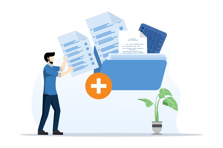 Man placing large documents into a blue folder with a plus sign, next to a potted plant.