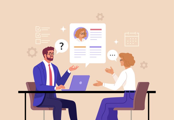 Illustration of a job interview with a man and woman seated at a table, icons above their heads, and a candidate profile between them.