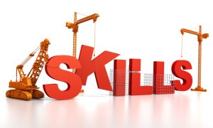 Illustration of the word “SKILLS” in large red 3D letters being constructed by three orange construction cranes and a bulldozer on a white background.