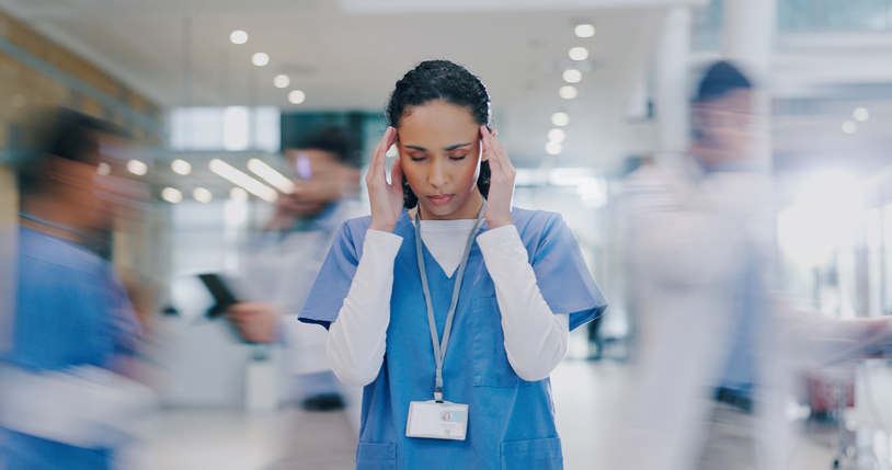 •	Nurse and woman with headache in hospital, stressed by a medical mistake, overwork, and burnout. Motion blur shows a healthcare worker experiencing migraines in a busy clinic, overwhelmed by fatigue, crisis, and frustration amid chaos.